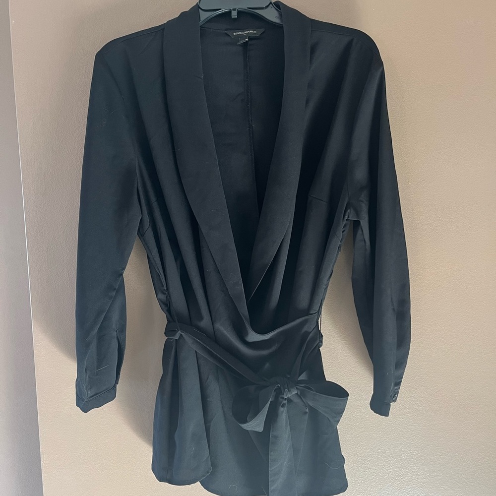 Cross body top with waist tie.